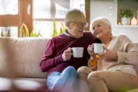 elderly-sitting-in-high-sofa-bed